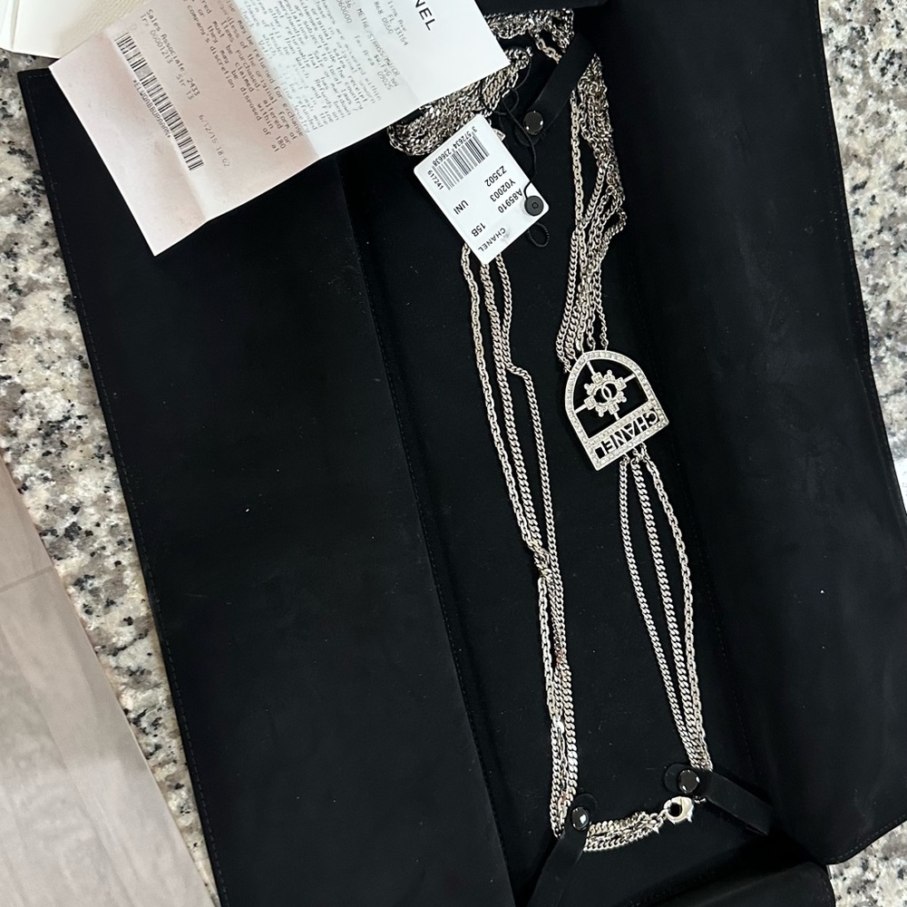 CHANEL Silver Necklace with Logo Pendant